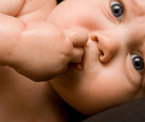 baby with teething pain (Essential Oil for Teething Pain)