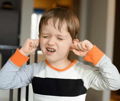 child with clogged ear (Essential Oil For Clogged Ear)